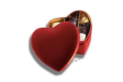 Grande boite en velours en forme de coeur contenant un assortiment de pralines Leonidas